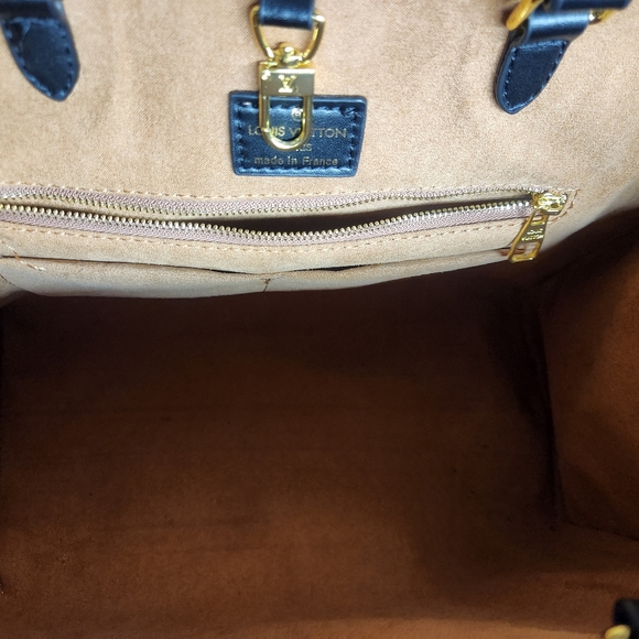 New black Louis Vuitton on the go Bag 2400 retail is 3440 - Picture 6 of 9